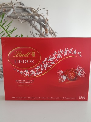 LINDOR MILK CHOCOLATE TRUFFLES Indiviually wrapped and melt in your mouth chocolate bites.