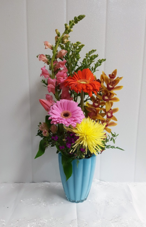 General-Living it Up features the beautiful cymbidium orchids