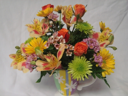 Reasonable bright cheery mug arrangements!! Bright seasonal mixed flowers arranged !