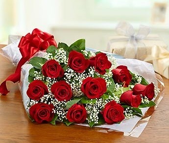 Long stem red roses wrapped (Free delivery in Barrie only)