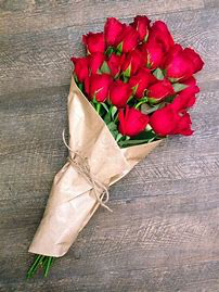 Loose wrapped 1dz Red Roses Loose wrapped in paper