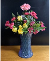 Love My Mom Purple vase of fresh cut flowers.