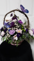 Love of purple centerpiece basket arrangement