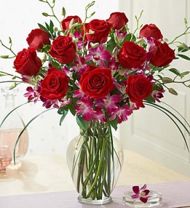 Sophicated Splendor Ruby Roses and Vibrant Dendrobium Orchids