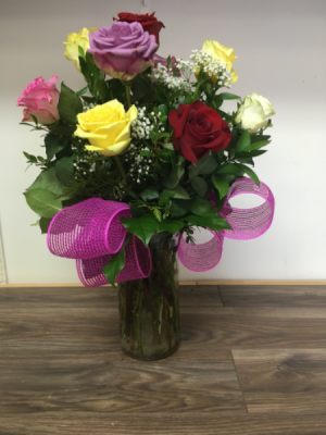 Rainbow of love  Mixed roses in a vase