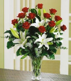loving lillies 12 long stem roses with white lillies. in Miami, FL | JOAN'S AROMA FLORIST