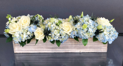 low and long, blue and white centerpiece