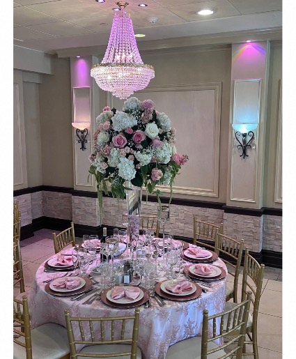 Lush pink and white table arrangements  Table arranment
