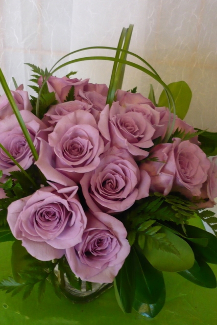 18 Lush Purple Roses Roses in a clear vase