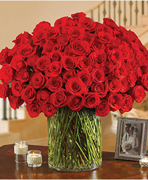 luxurious bouquet of 100 romantic long-stem red  ROSES
