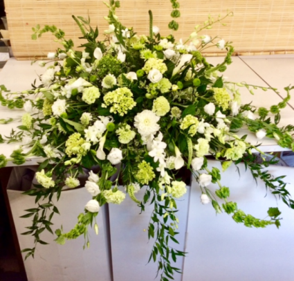 Magnificent Green and White Casket Spray 
