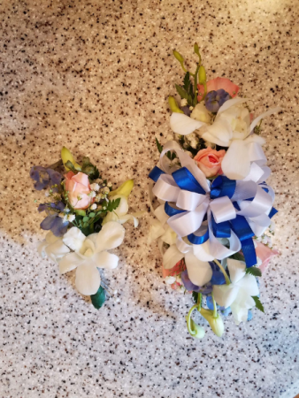 Matching boutonniere and corsage  