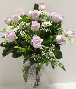 Lavender Medium Roses Arranged in glass vase