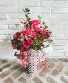 Merry & Bright Tumbler Floral arrangement