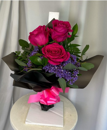 Mini Fuchsia Flame 3 Fuchsia rose with purple filler wrapped or vase