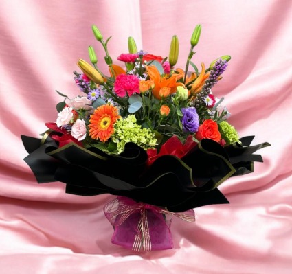 MIXED BOUQUET BRIGTH COLORS IN WRAPPING PAPER 