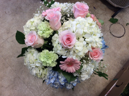 Mixed colours of flowers in vase Vase arrangement
