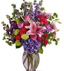 BS 1-Mixed flower arrangement in a tall vase (Flowers and colors may vary)