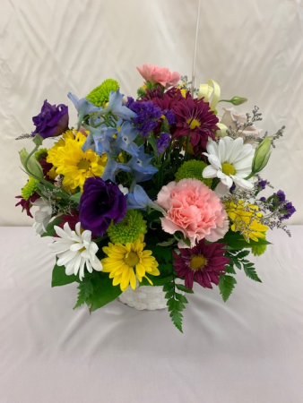 Mixed Flowers in basket Just because