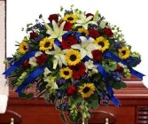 Mixed Flowers in Yellow, Red, Blue, and White Casket Spray
