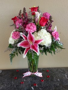 Mom's Red Roses and Stargazer Lilies  Exclusively at Mom & Pops