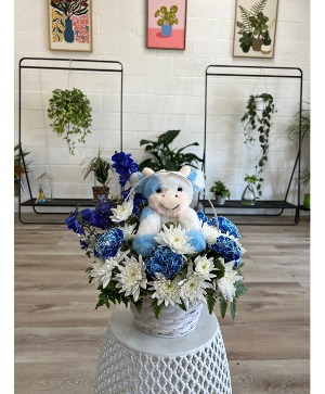 Moo-lificent Blooms: A Floral Welcome for Baby 