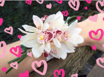 Double Orchid Wrist Corsage Adored with ribbon and glitz. in Ozone Park, NY | Heavenly Florist Double Orchid Wrist Corsage Adored with ribbon and glitz. in Ozone Park, NY | Heavenly Florist