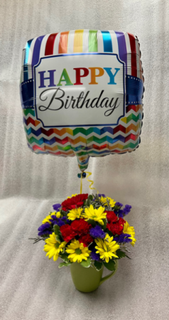Mug of flowers with birthday mylar balloon.  Flower arrangement