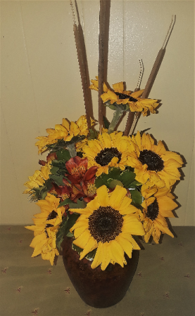 October Sun Sun flowers in ceramic vase.