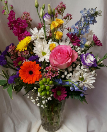SUMMER DELIGHT...SEASONAL FLOWERS ARRANED IN A VAS Depending on stock...some flowers and colors could be substituted 