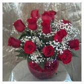 One Dozen Red Roses in large fish bowl  