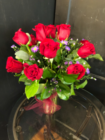 One dozen roses in french market tin