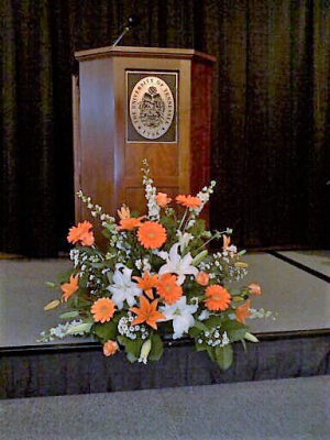 Orange and white arrangement Podium arrangement
