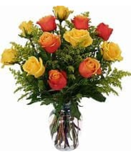 Orange And Yellow Roses Arranged In A Vase 