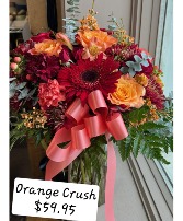 Orange Crush Frsh floral arrangement oranges and reds