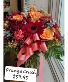 Orange Crush Frsh floral arrangement oranges and reds