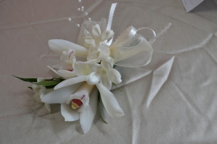 small white orchid  pin on corsage
