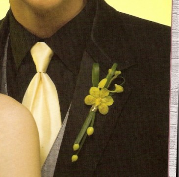 Orchid with grasses and berries Boutonniere