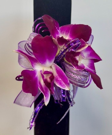 Orchid Wrist  Corsage in Denison, TX | JUDY'S FLOWER SHOPPE Orchid Wrist  Corsage in Denison, TX | JUDY'S FLOWER SHOPPE