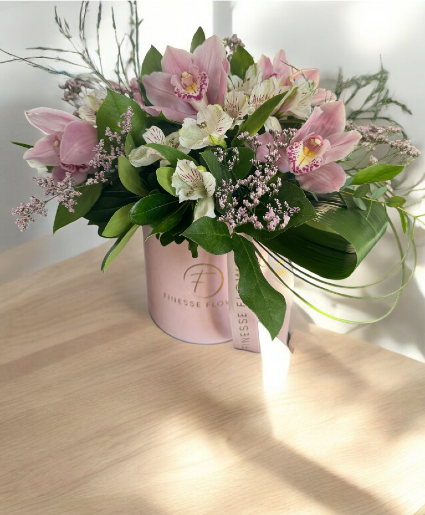 Orchids in the velvet box Vase arrangement 