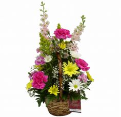OUR THOUGHTS ARE WITH YOU Wicker basket filled with a colorful arrangement of flowers 