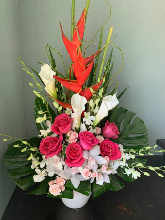 PARADISE ARRANGEMENT ELEGANT MIXTURE OF TROPICAL FLOWERS
