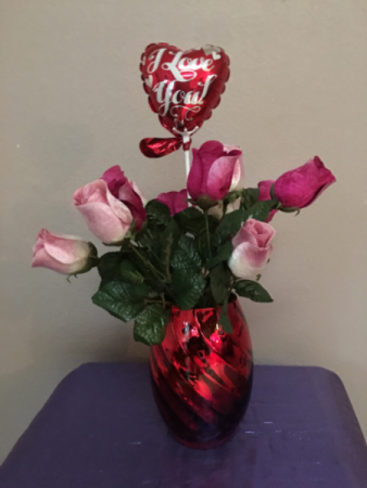 Passion  for pink Silk pink roses. In red vase  with mylar