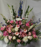 "Pastel Flowers"...pinks, whites, and lavenders  Funeral arrangement.