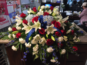 Patriotic bliss  Red white and blue casket spray 