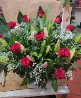 Pavoreal red roses and  oriental lilies  Valentine arrangement