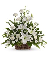 Peaceful lilies Basket sympathy arrangement