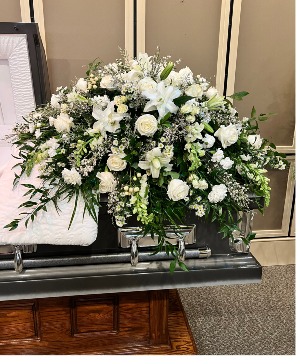 Peaceful memories casket spray