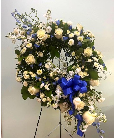 Peaceful Sky Wreath By Enchanted Florist Cape Coral  in Cape Coral, FL | ENCHANTED FLORIST OF CAPE CORAL