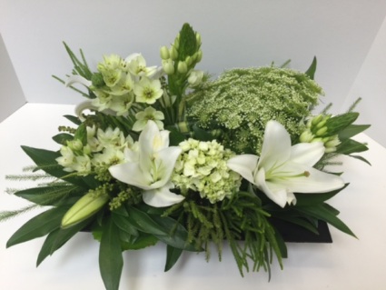 Peaceful low centerpiece arrangement